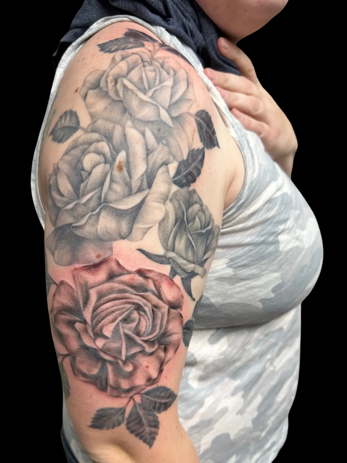 Black and grey rose tattoo by Lacey Rawson, Dublin Ohio
