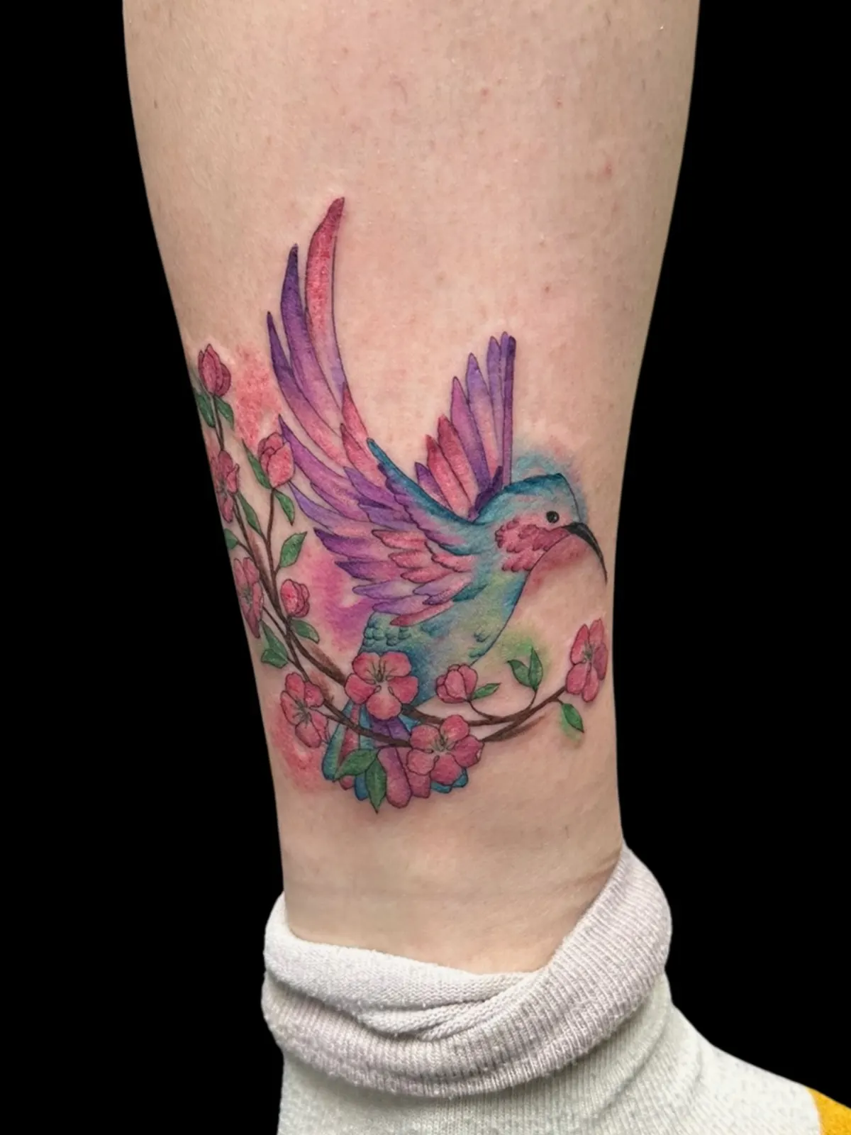 Bird watercolor tattoo by Lacey Rawson